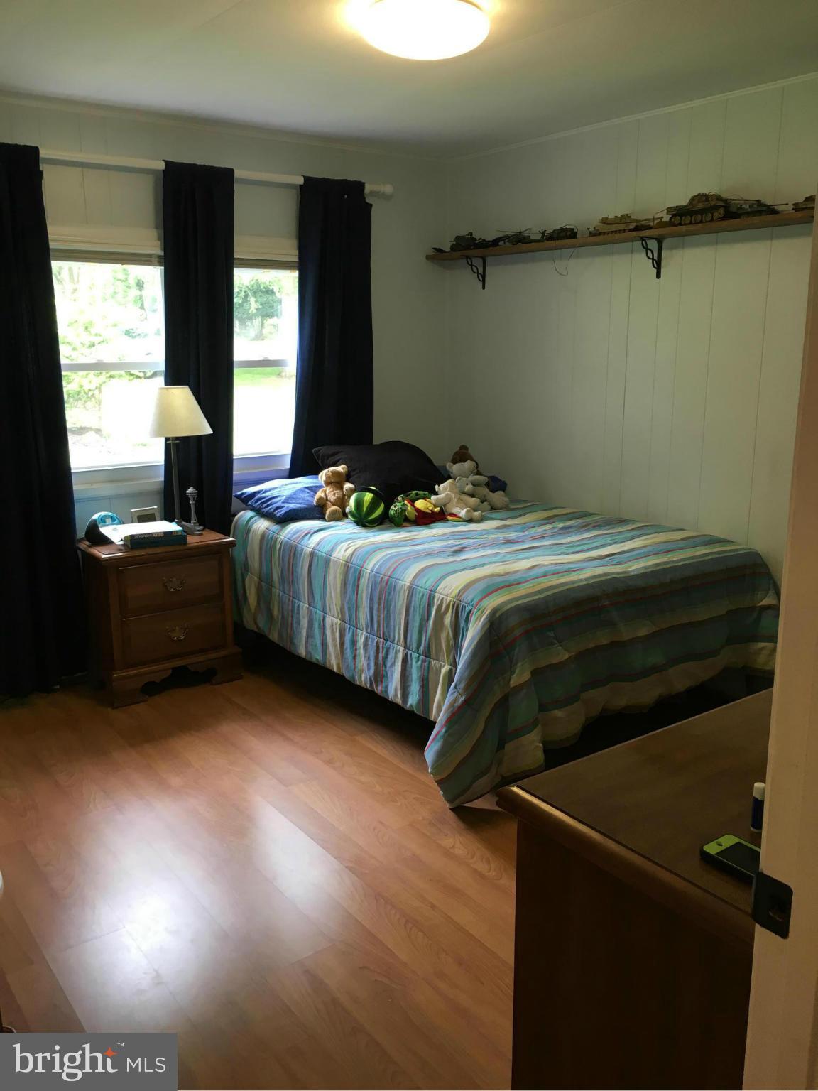 1012 Vale Road Bel Air, MD 21014 - Photo 21 of 27 a bedroom with bed and window