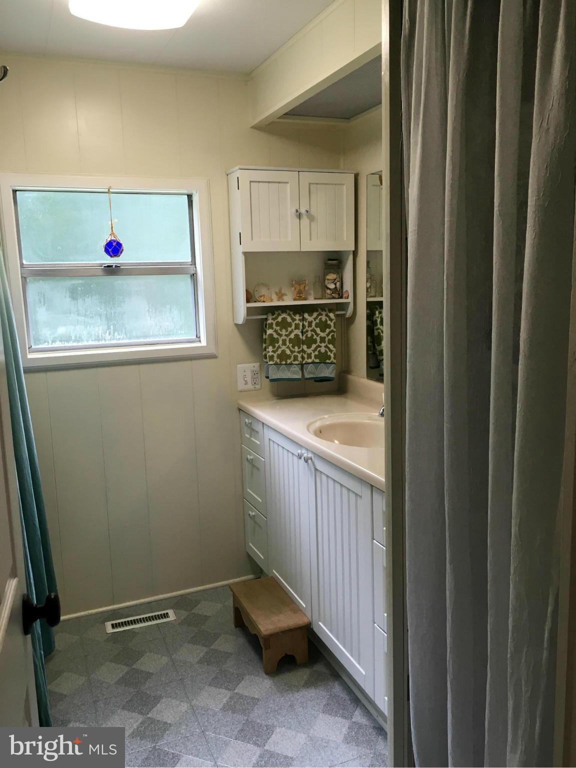 1012 Vale Road Bel Air, MD 21014 - Photo 22 of 27 a kitchen with a sink and cabinets