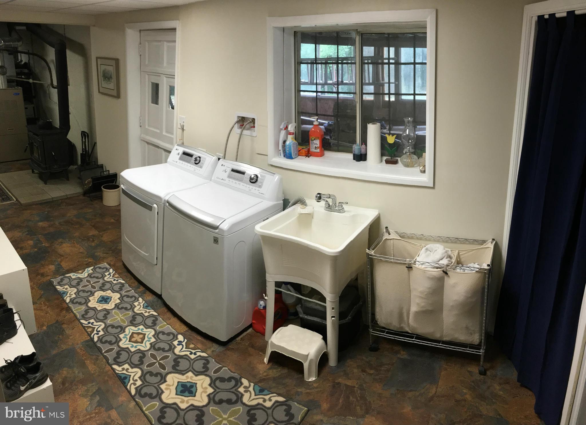 1012 Vale Road Bel Air, MD 21014 - Photo 25 of 27 a utility room with sink dryer and washer