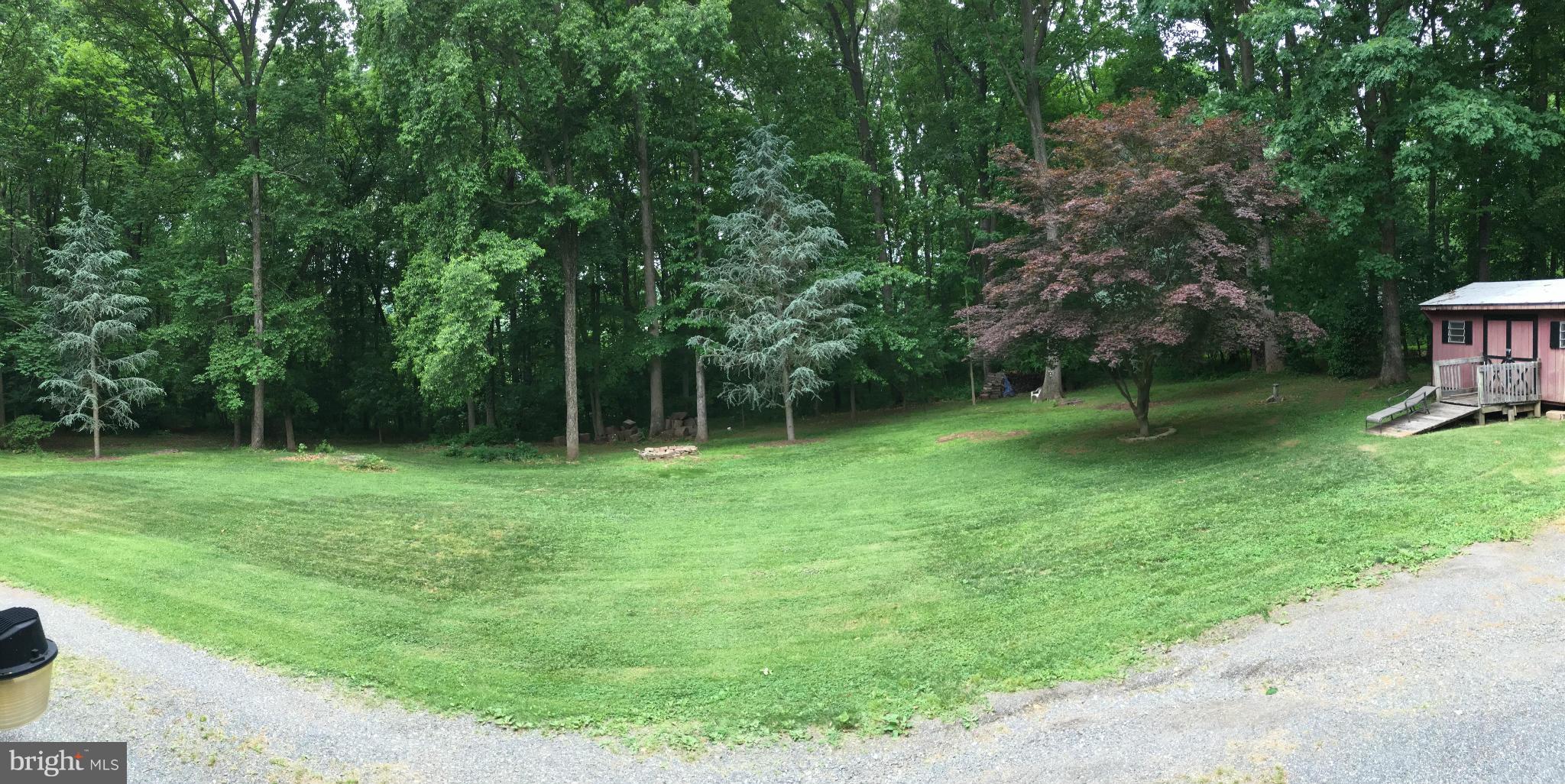 1012 Vale Road Bel Air, MD 21014 - Photo 8 of 27 a backyard of a house with lots of green space