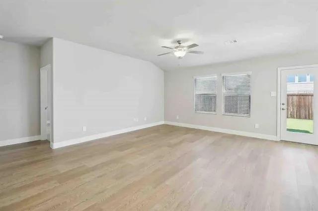 an empty room with windows