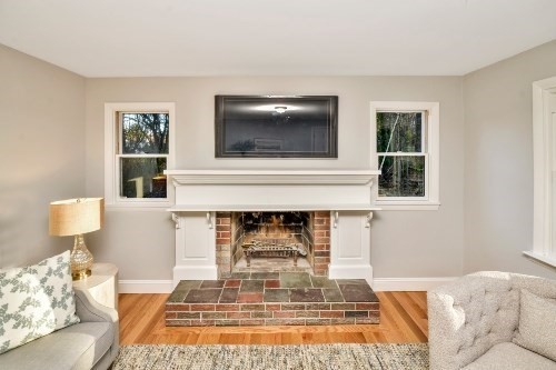 903 Main Street Bolton, MA 01740 - Photo 24 of 39 a living room with furniture and a fireplace