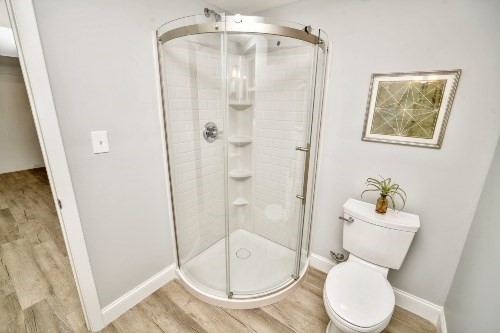 903 Main Street Bolton, MA 01740 - Photo 30 of 39 a bathroom with a toilet and shower