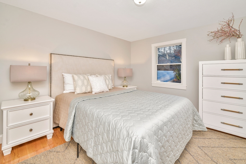 903 Main Street Bolton, MA 01740 - Photo 10 of 39 a bedroom with a bed and a window