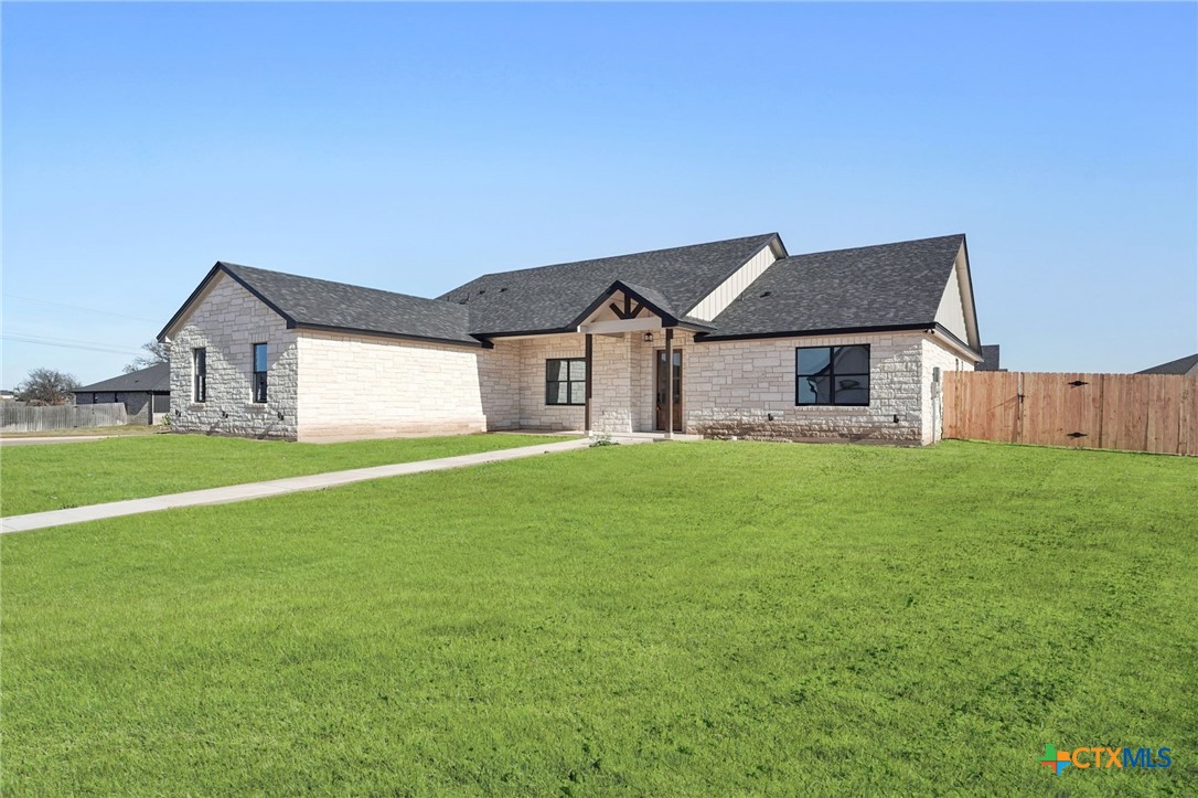 5207 Hollow Ranch Drive Salado, TX 76571 - Photo 35 of 37 a front view of a house with yard and green space