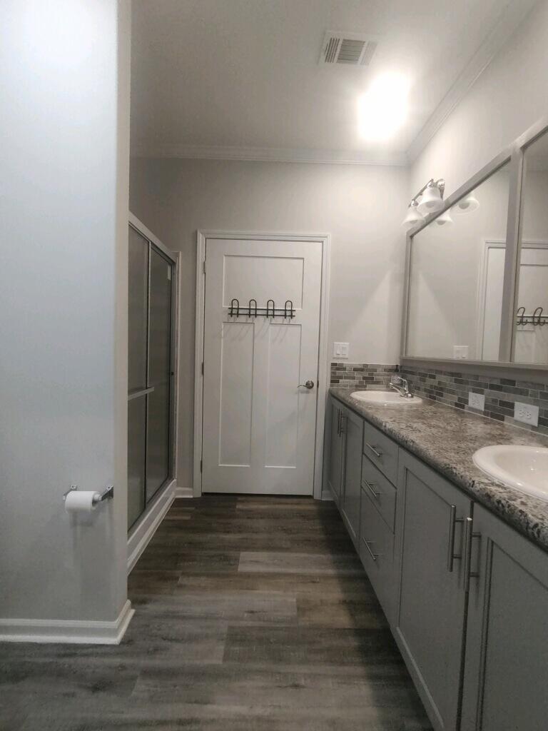 31343 Ave I Big Pine Key, FL 33043 - Photo 13 of 29 a bathroom with a sink and a mirror