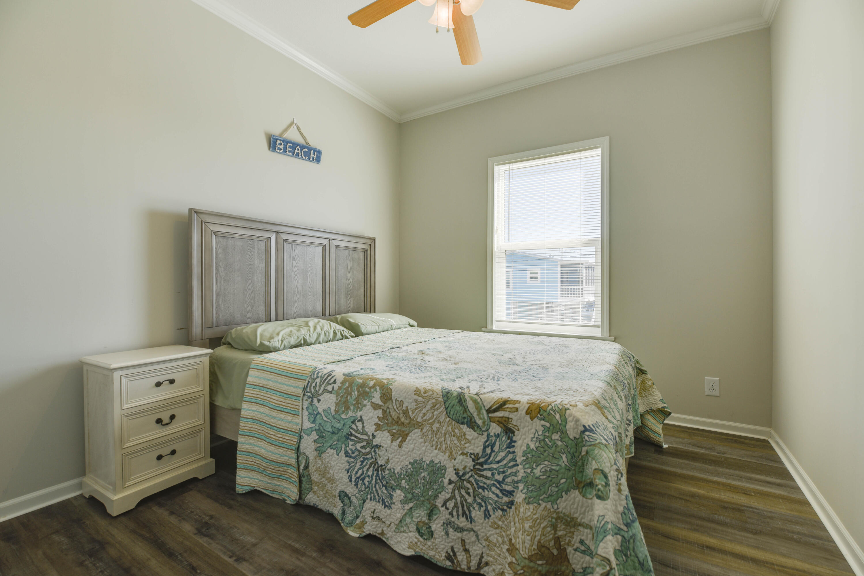 31343 Ave I Big Pine Key, FL 33043 - Photo 15 of 29 a bedroom with a bed and a window