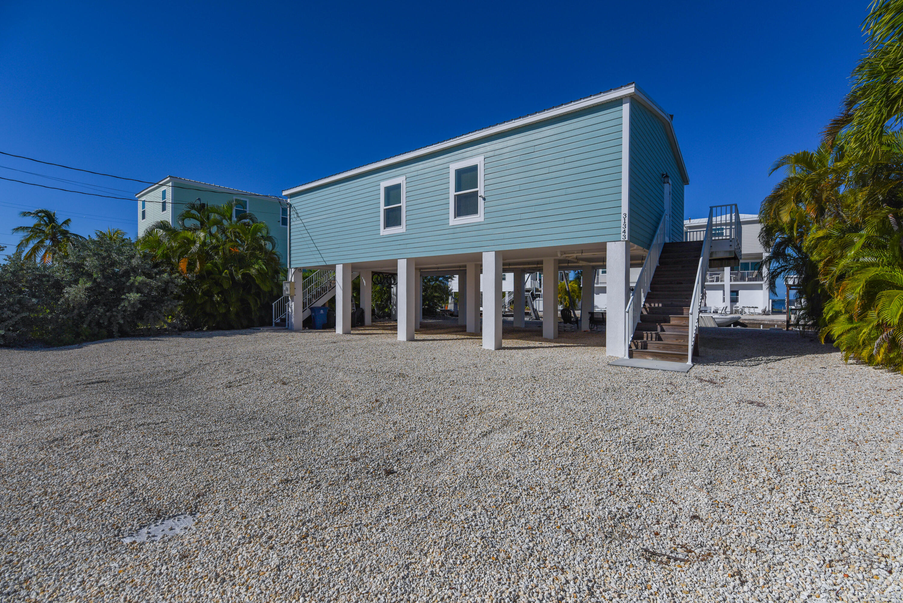31343 Ave I Big Pine Key, FL 33043 - Photo 20 of 29 a view of a house with a backyard