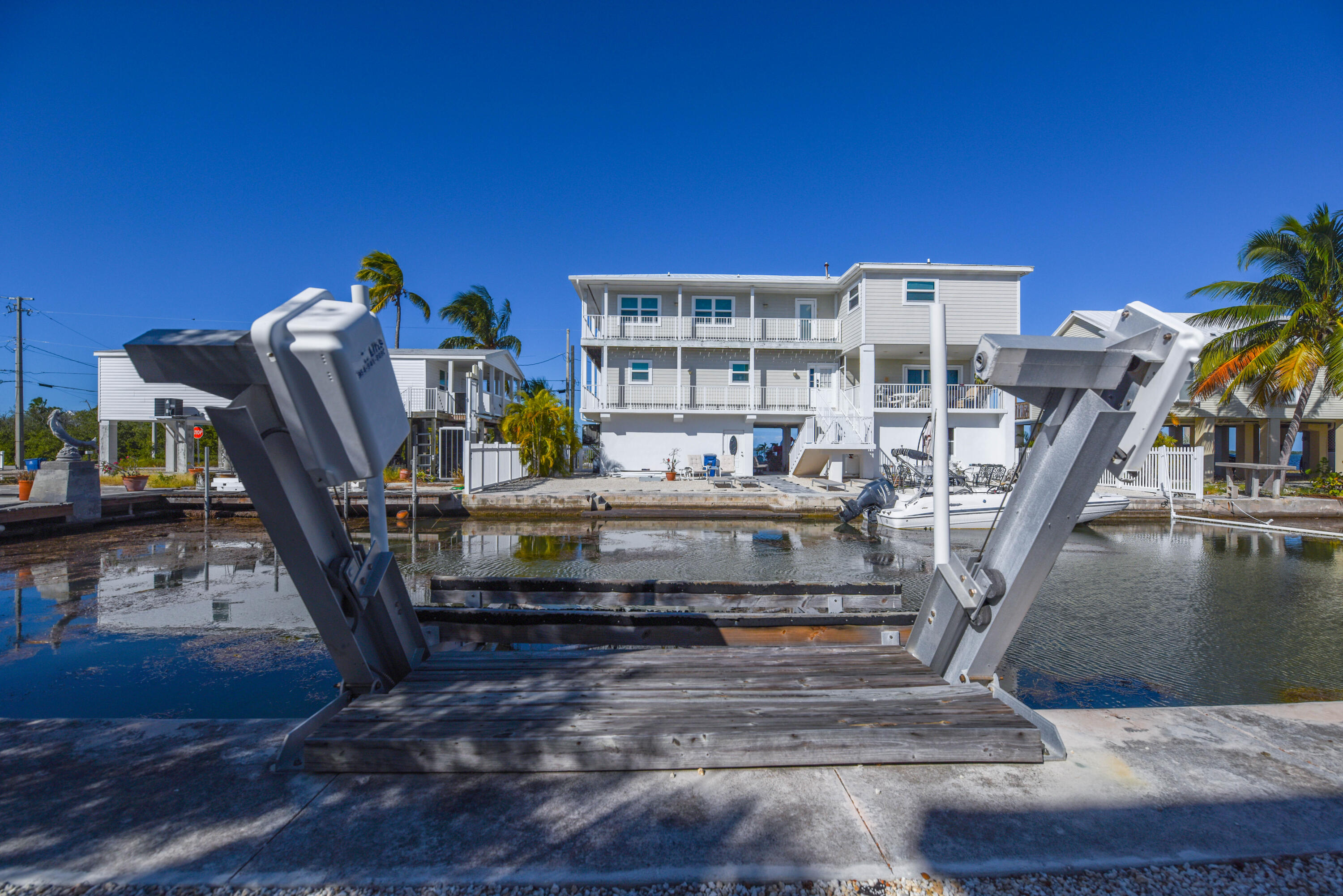 31343 Ave I Big Pine Key, FL 33043 - Photo 23 of 29 a view of staircase with furniture and rug
