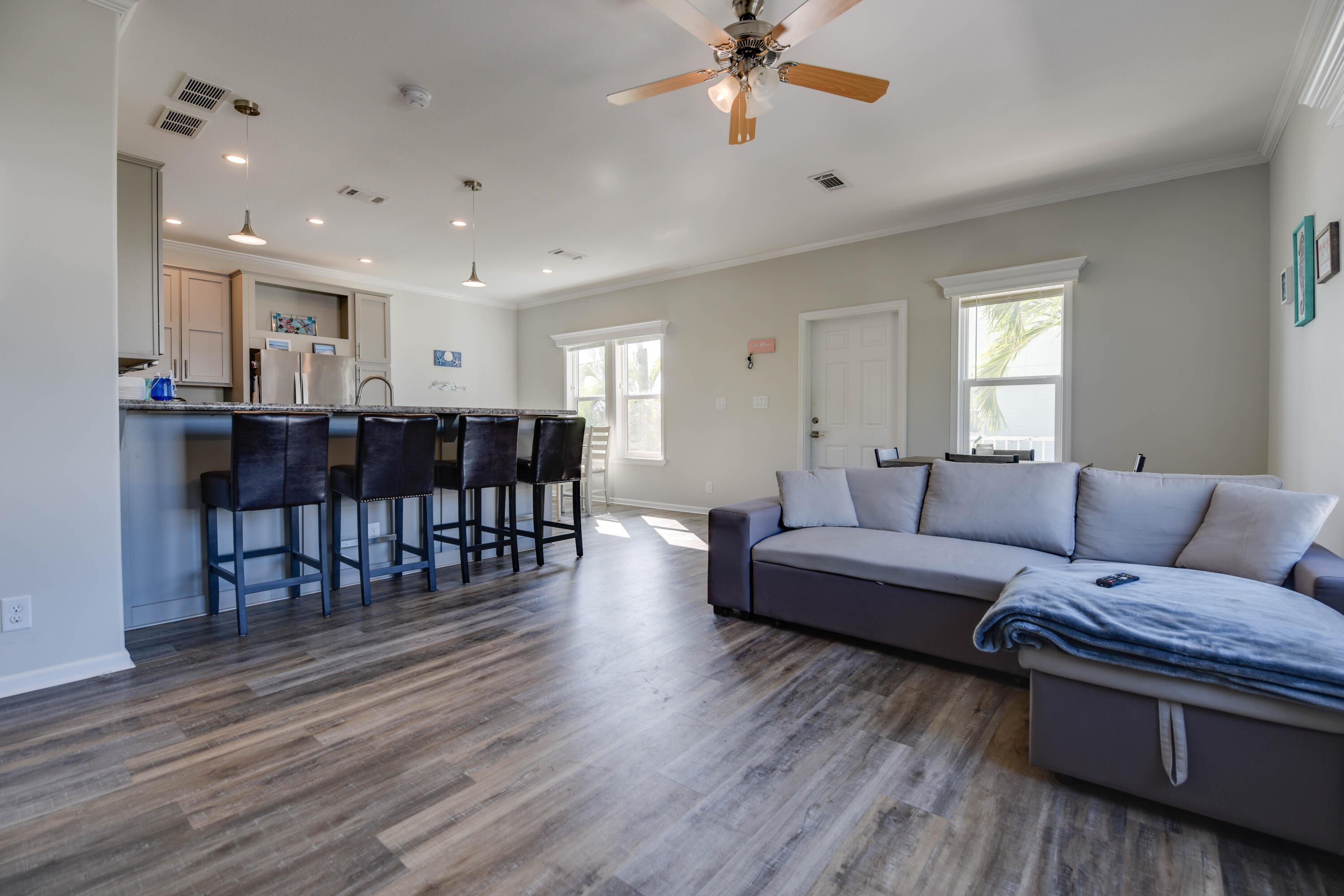 31343 Ave I Big Pine Key, FL 33043 - Photo 8 of 29 a living room with furniture and wooden floor