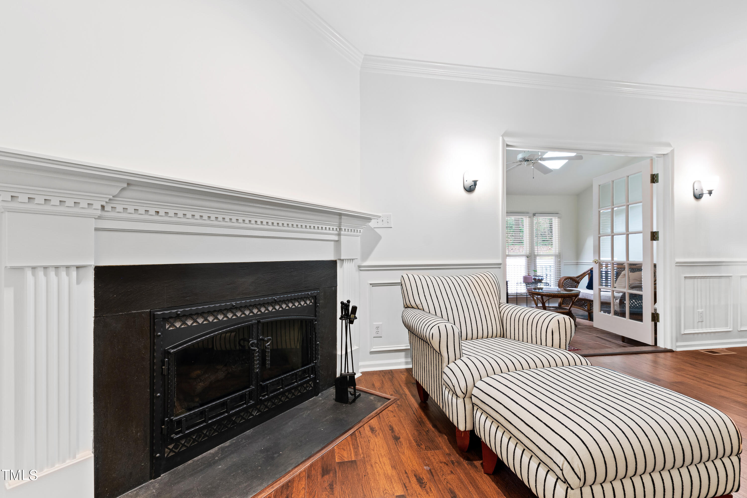 3834 Carnegie Lane Raleigh, NC 27612 - Photo 18 of 38 a living room with furniture and a fireplace