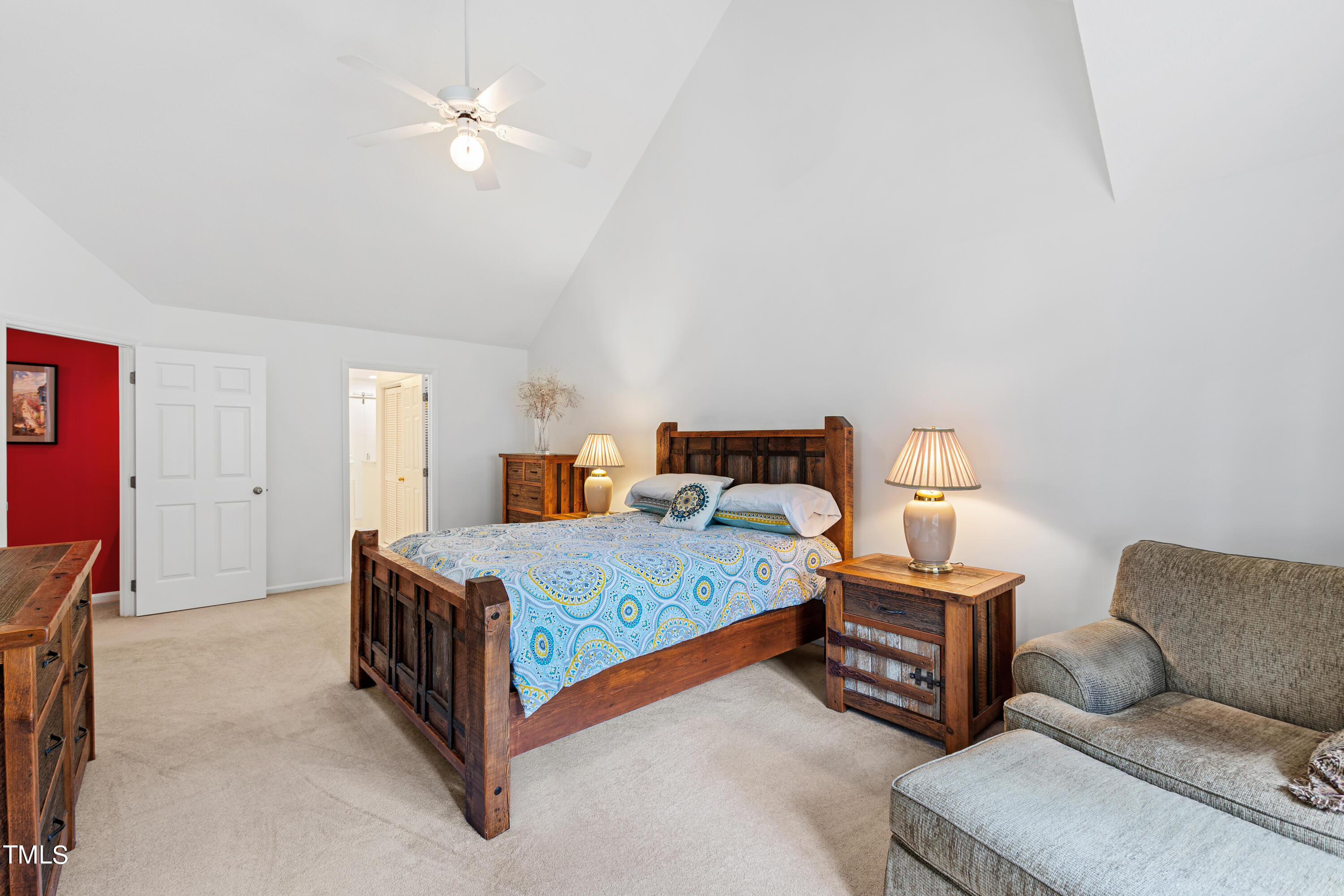 3834 Carnegie Lane Raleigh, NC 27612 - Photo 29 of 38 a bedroom with a bed and a couch