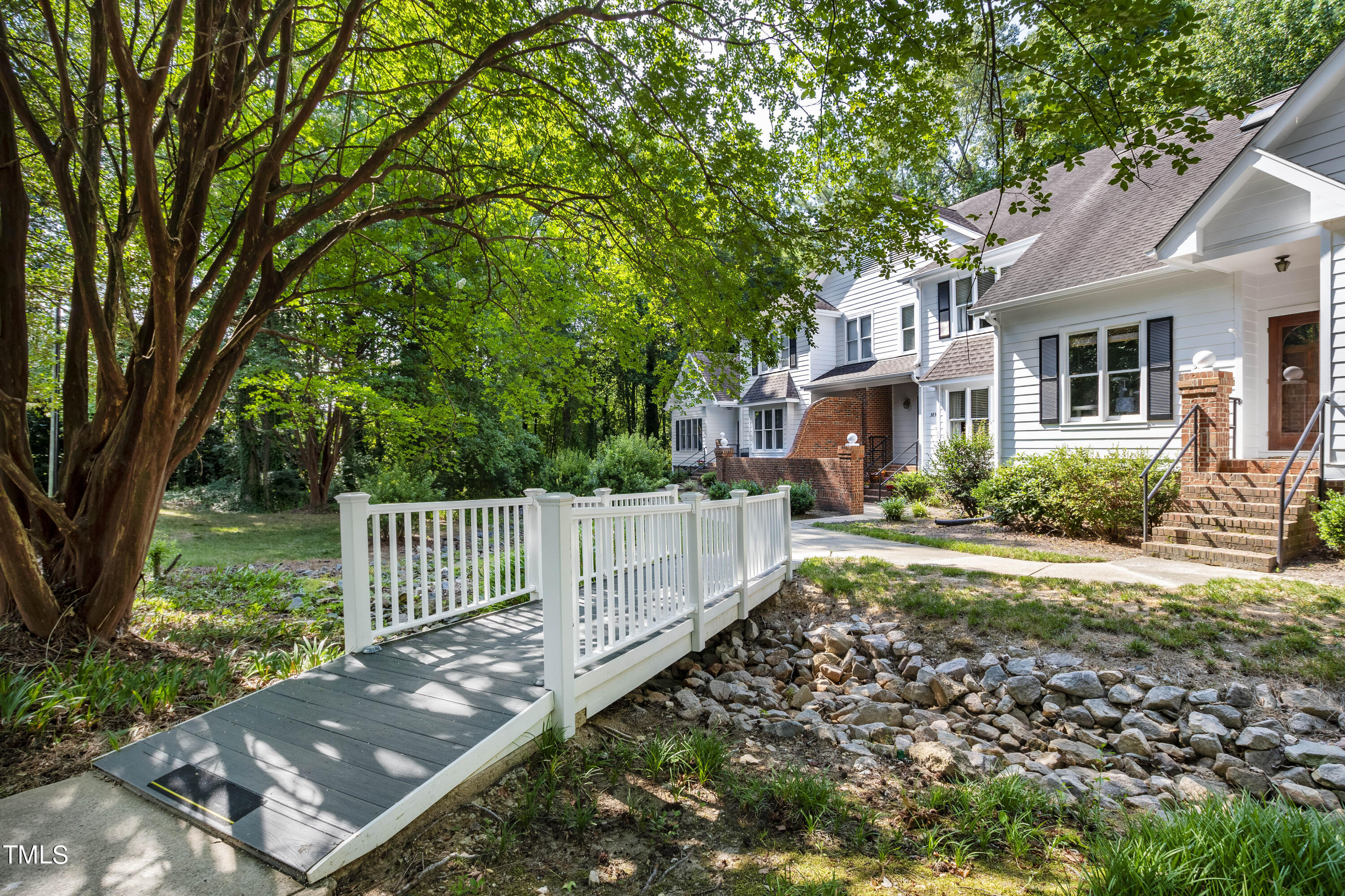 3834 Carnegie Lane Raleigh, NC 27612 - Photo 3 of 38 a view of a house with backyard and wooden fence