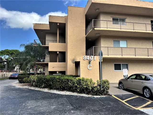 a front view of a house with yard
