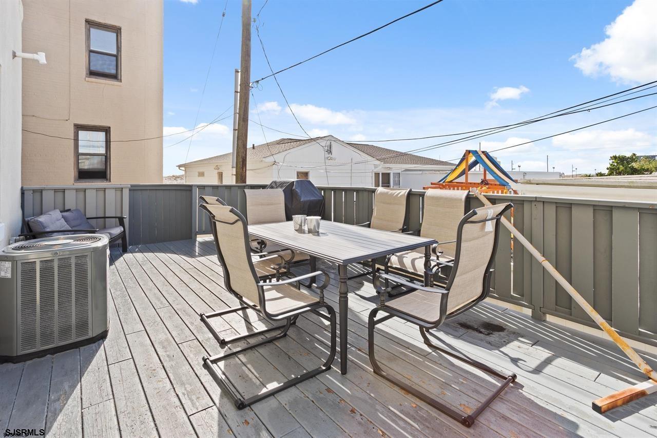 114 South Raleigh Avenue Atlantic City, NJ 08401 - Photo 13 of 52 a view of a patio with table and chairs