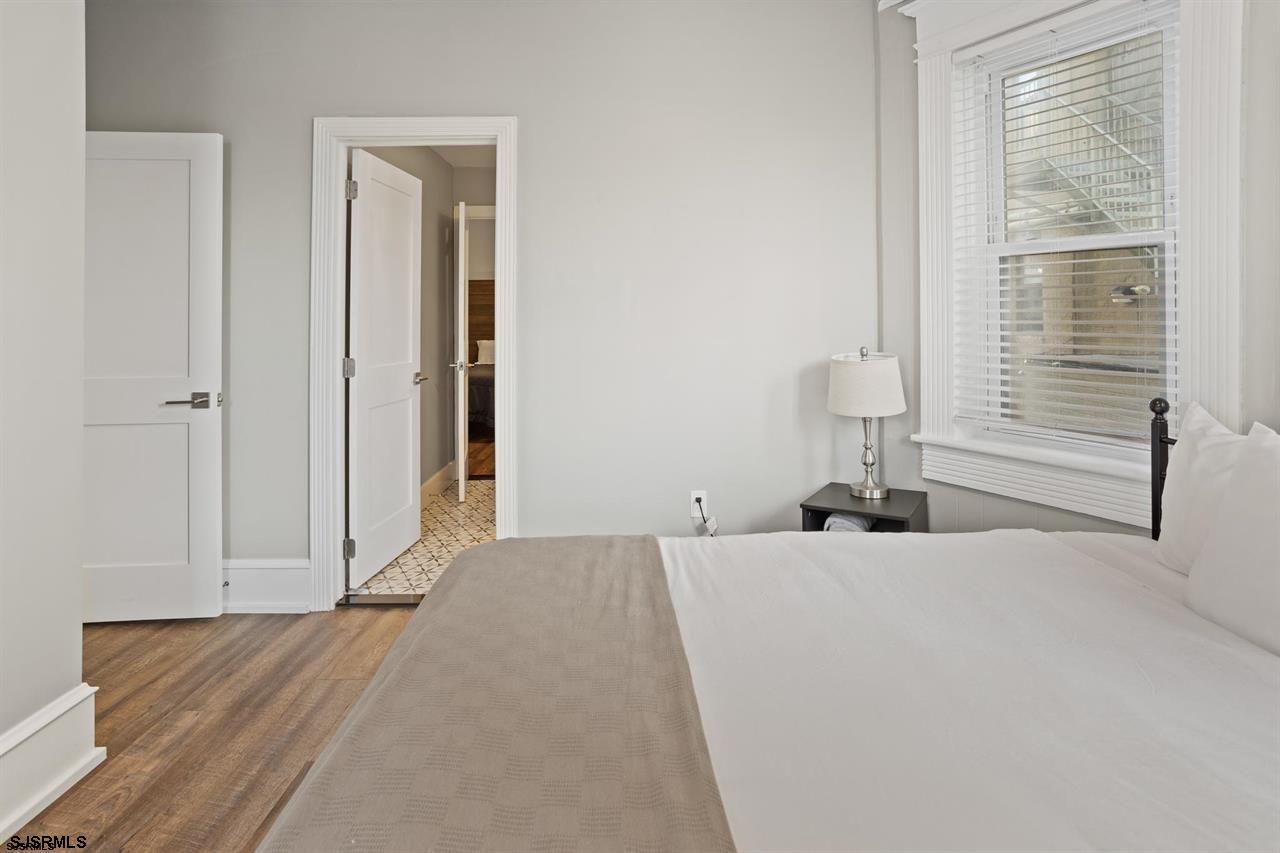 114 South Raleigh Avenue Atlantic City, NJ 08401 - Photo 18 of 52 a bedroom with a bed and a window