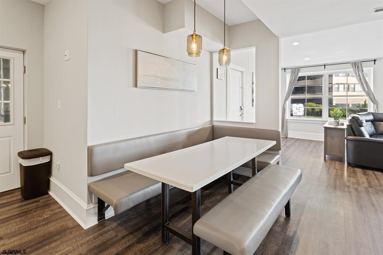 114 South Raleigh Avenue Atlantic City, NJ 08401 - Photo 38 of 52 a living room with furniture rug and wooden floor