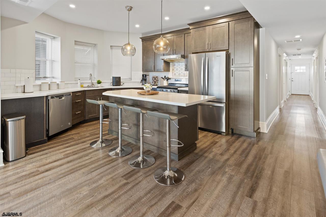 114 South Raleigh Avenue Atlantic City, NJ 08401 - Photo 10 of 52 a kitchen with a sink appliances and cabinets