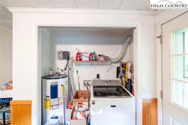 a utility room with dryer and washer