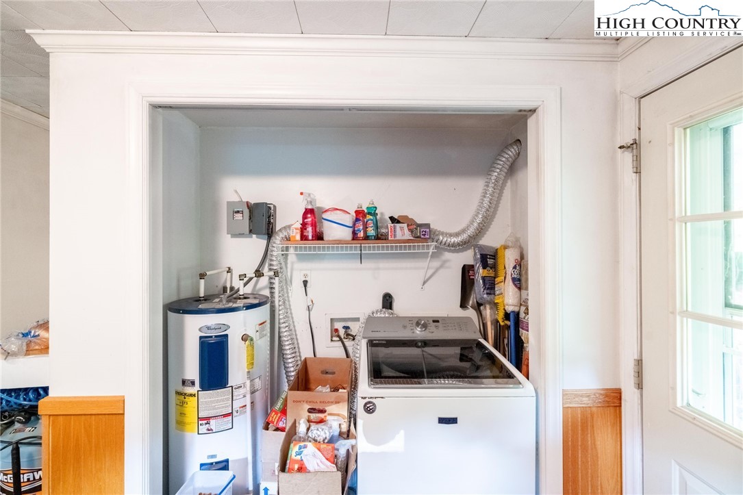 4690 3 Top Road Todd, NC 28684 - Photo 15 of 49 a utility room with dryer and washer