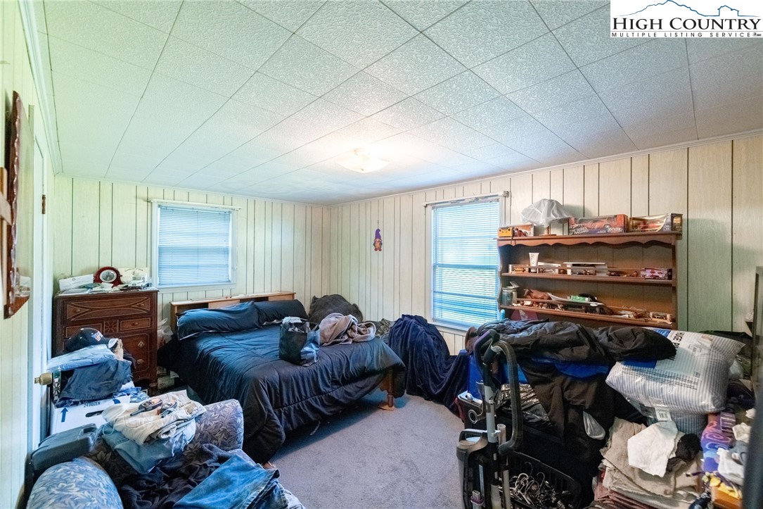 4690 3 Top Road Todd, NC 28684 - Photo 18 of 49 a living room with furniture and a fireplace