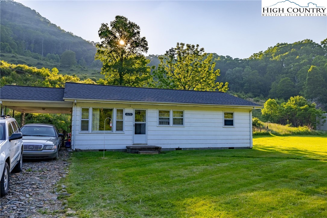 4690 3 Top Road Todd, NC 28684 - Photo 2 of 49 a view of a house with a backyard