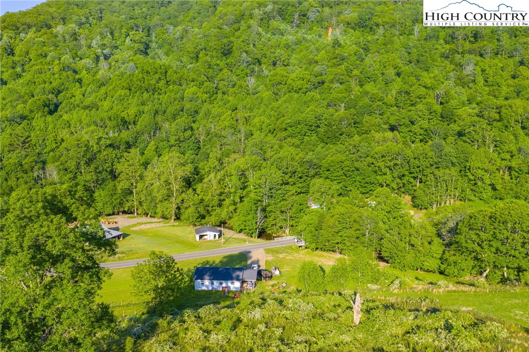 4690 3 Top Road Todd, NC 28684 - Photo 32 of 49 a view of an outdoor space with a lake view