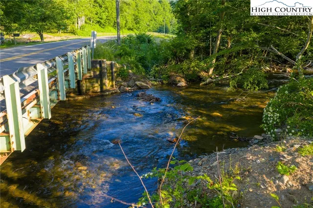 a view of lake background with green space