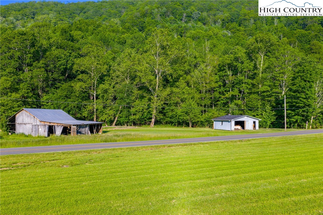 4690 3 Top Road Todd, NC 28684 - Photo 7 of 49 a house view with a swimming pool