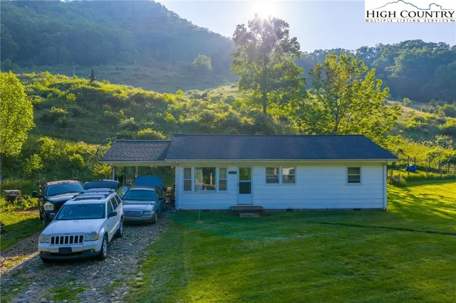 a view of a yard with furniture
