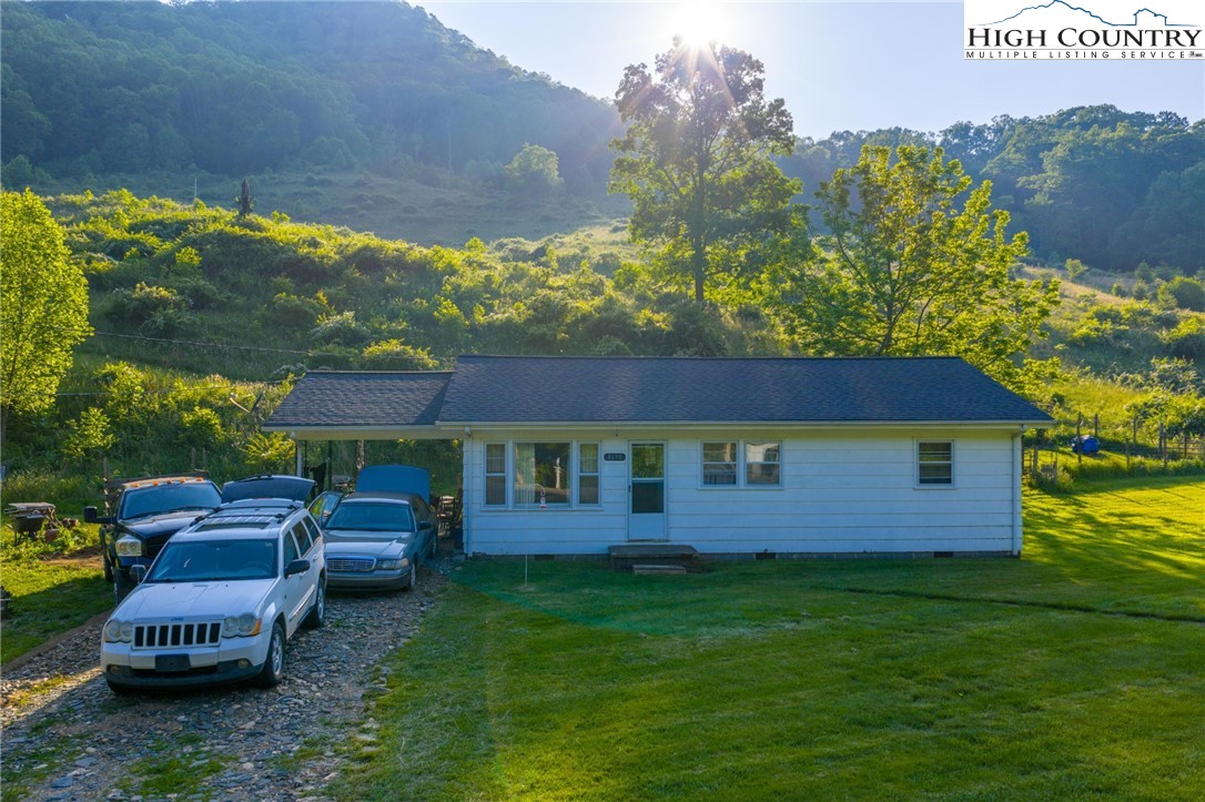 4690 3 Top Road Todd, NC 28684 - Photo 10 of 49 a view of a yard with furniture