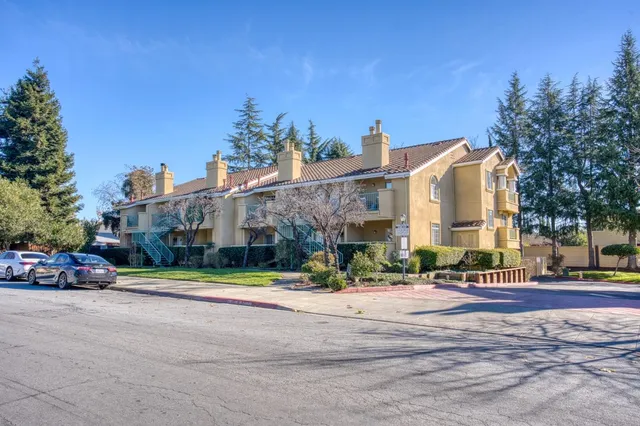a view of a building with a street