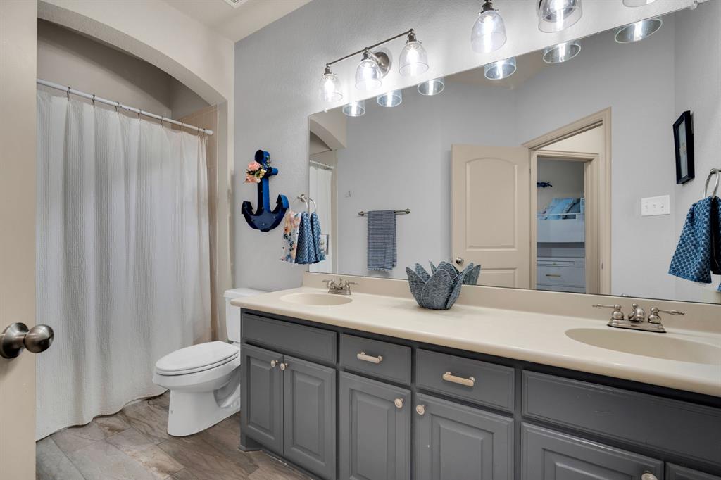 5009 Prosperity Row Midlothian, TX 76065 - Photo 25 of 34 Guest Bathroom with double sinks