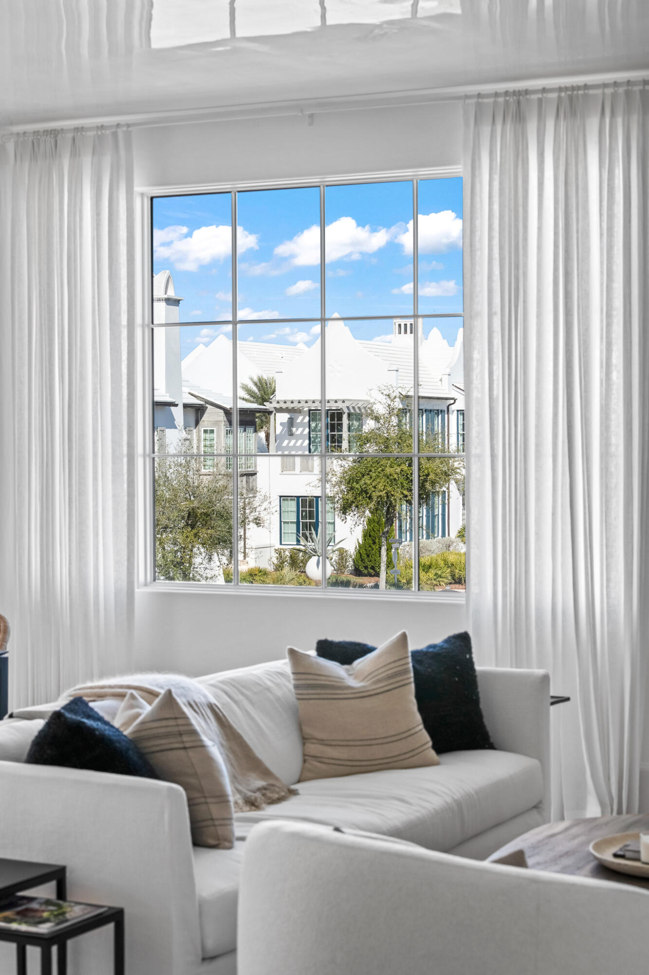 27 Admiralty Row, Unit 201 Inlet Beach, FL 32461 - Photo 11 of 35 a living room with furniture and a window