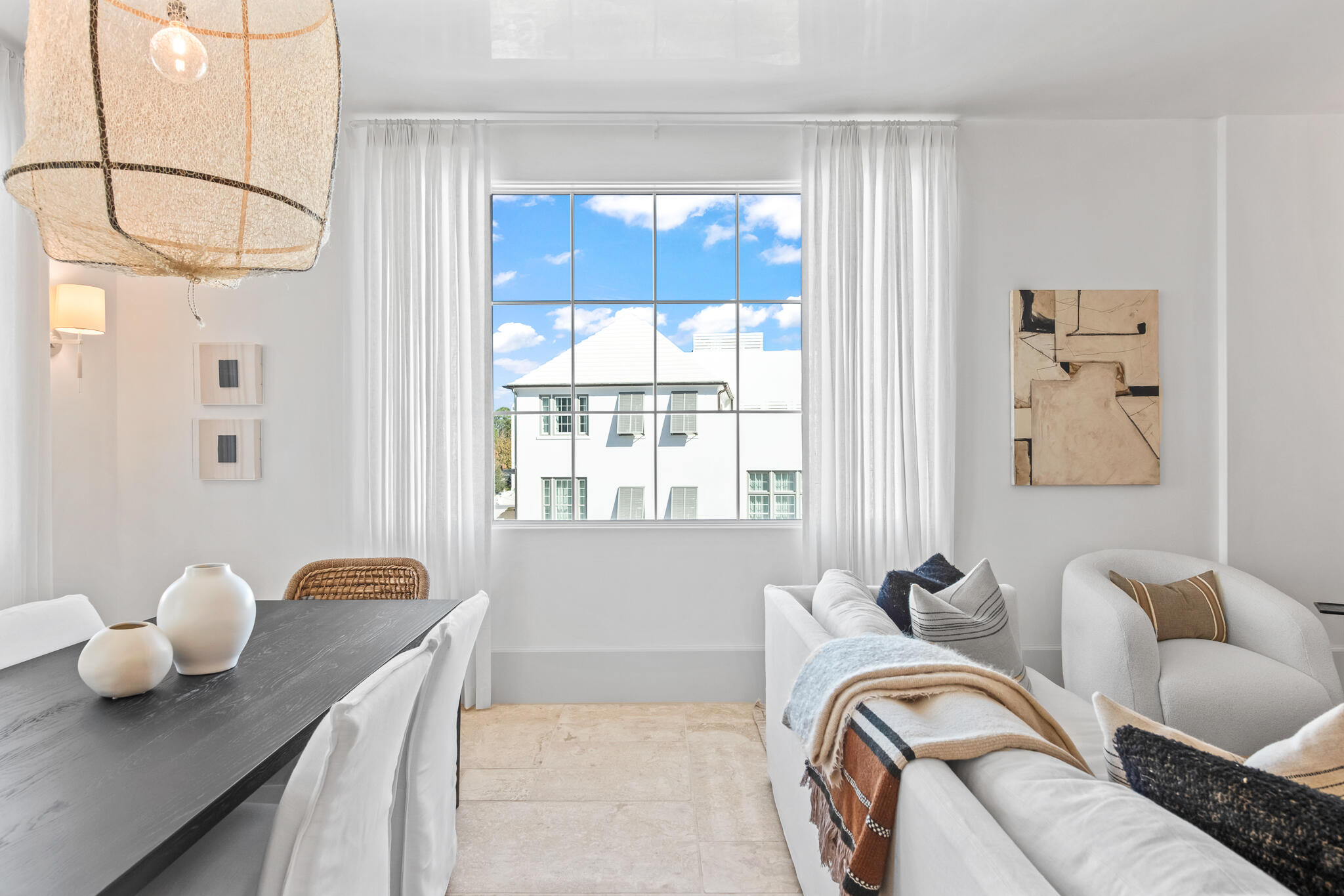 27 Admiralty Row, Unit 201 Inlet Beach, FL 32461 - Photo 12 of 35 a bedroom with a bed and a chandelier