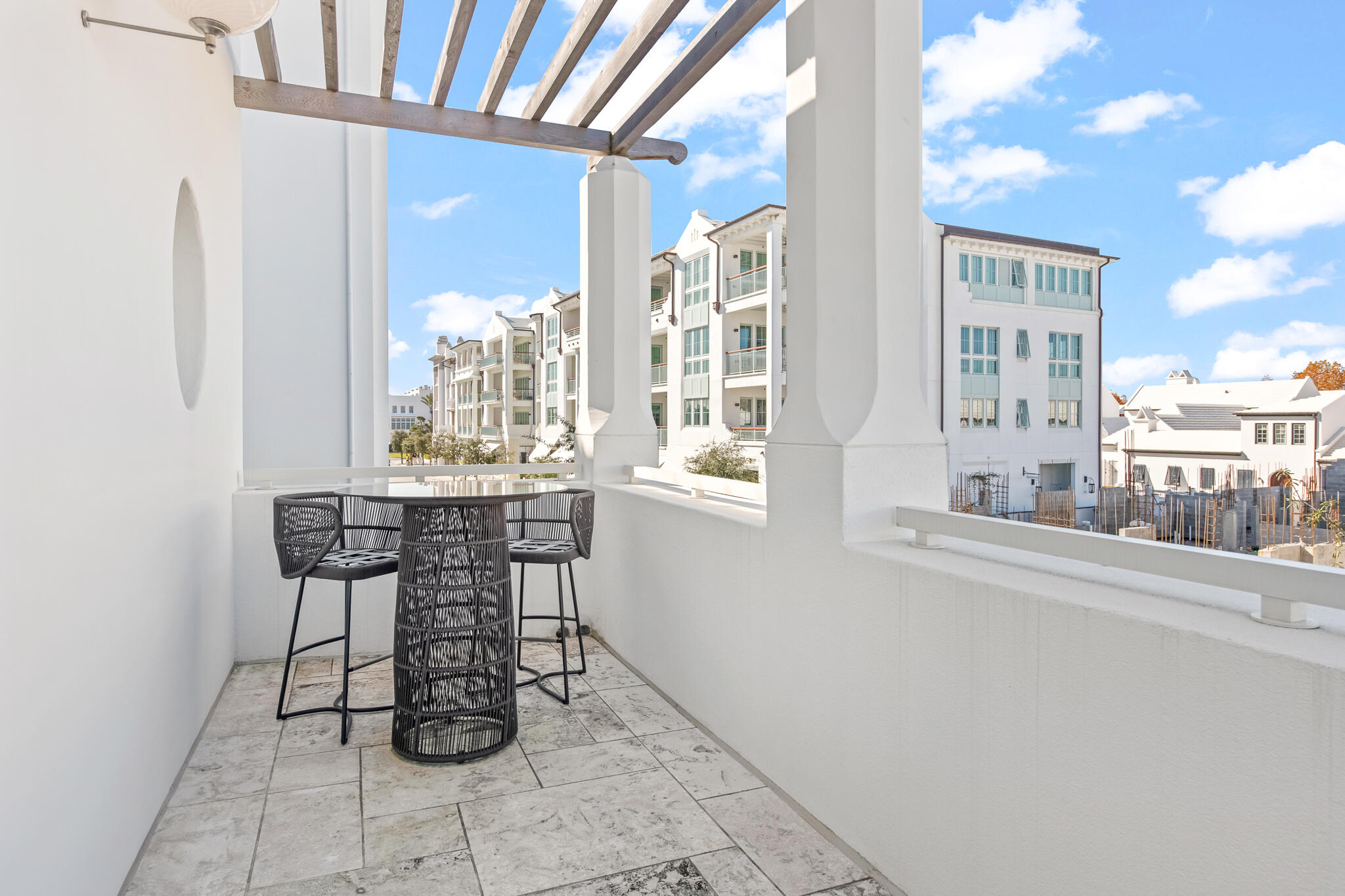 27 Admiralty Row, Unit 201 Inlet Beach, FL 32461 - Photo 14 of 35 a dining room with furniture and large windows