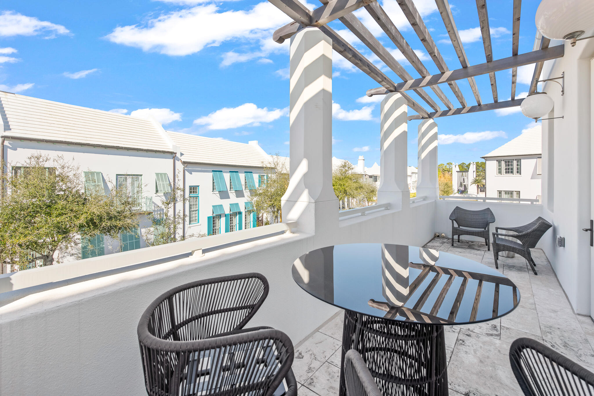 27 Admiralty Row, Unit 201 Inlet Beach, FL 32461 - Photo 16 of 35 a view of a dining room with furniture window and outside view