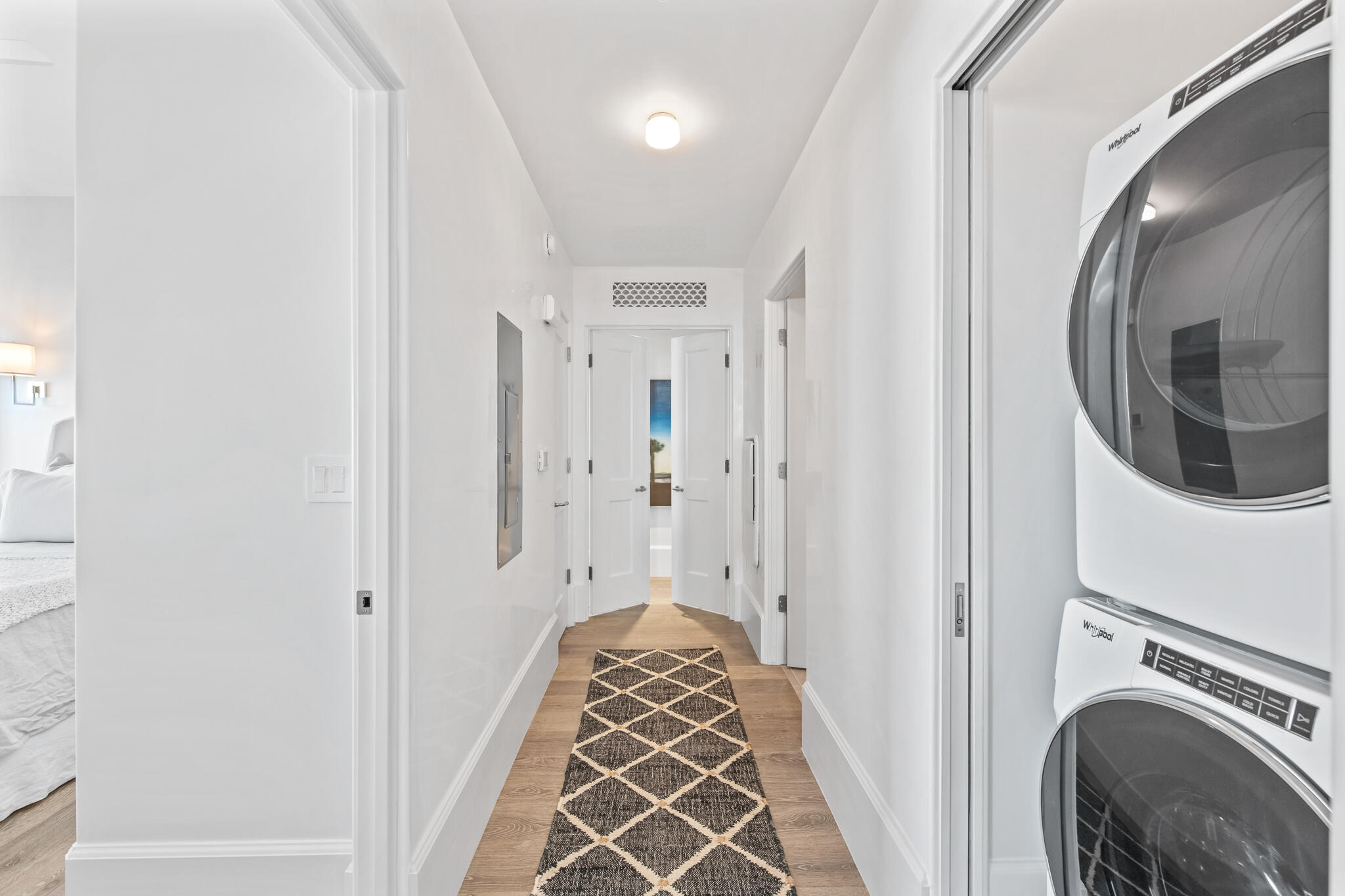 27 Admiralty Row, Unit 201 Inlet Beach, FL 32461 - Photo 18 of 35 a view of a hallway with washer and dryer
