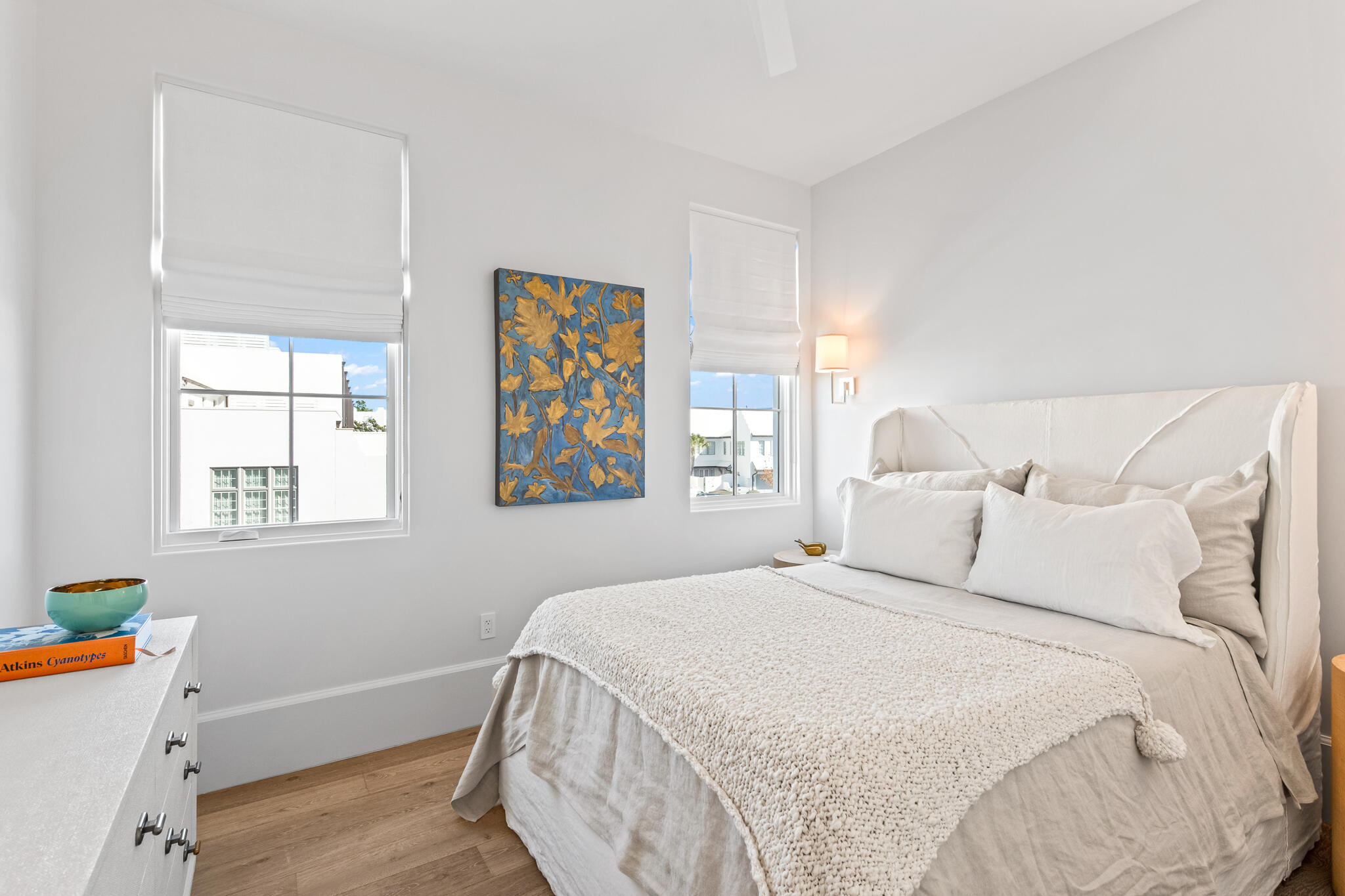 27 Admiralty Row, Unit 201 Inlet Beach, FL 32461 - Photo 19 of 35 a bedroom with a bed and a window