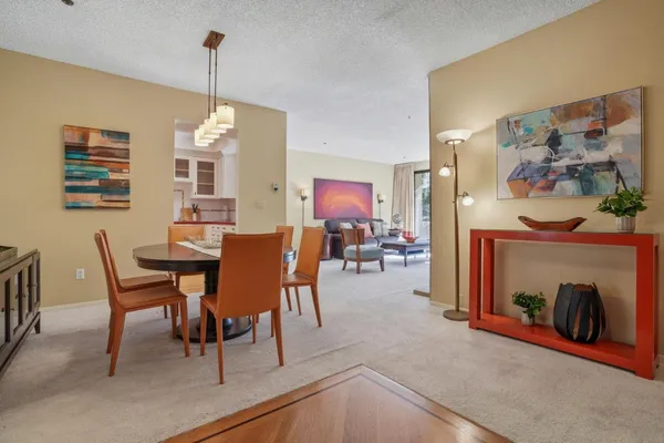 a view of a livingroom and dining room