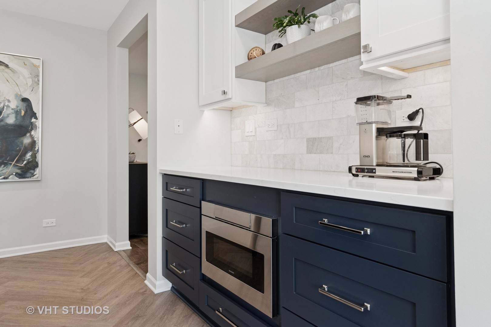 13423 Summergrove Drive Plainfield, IL 60585 - Photo 11 of 37 a room with cabinets and wooden floor