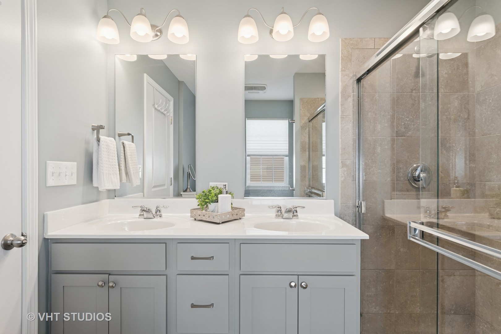13423 Summergrove Drive Plainfield, IL 60585 - Photo 18 of 37 a bathroom with a sink double vanity and a mirror