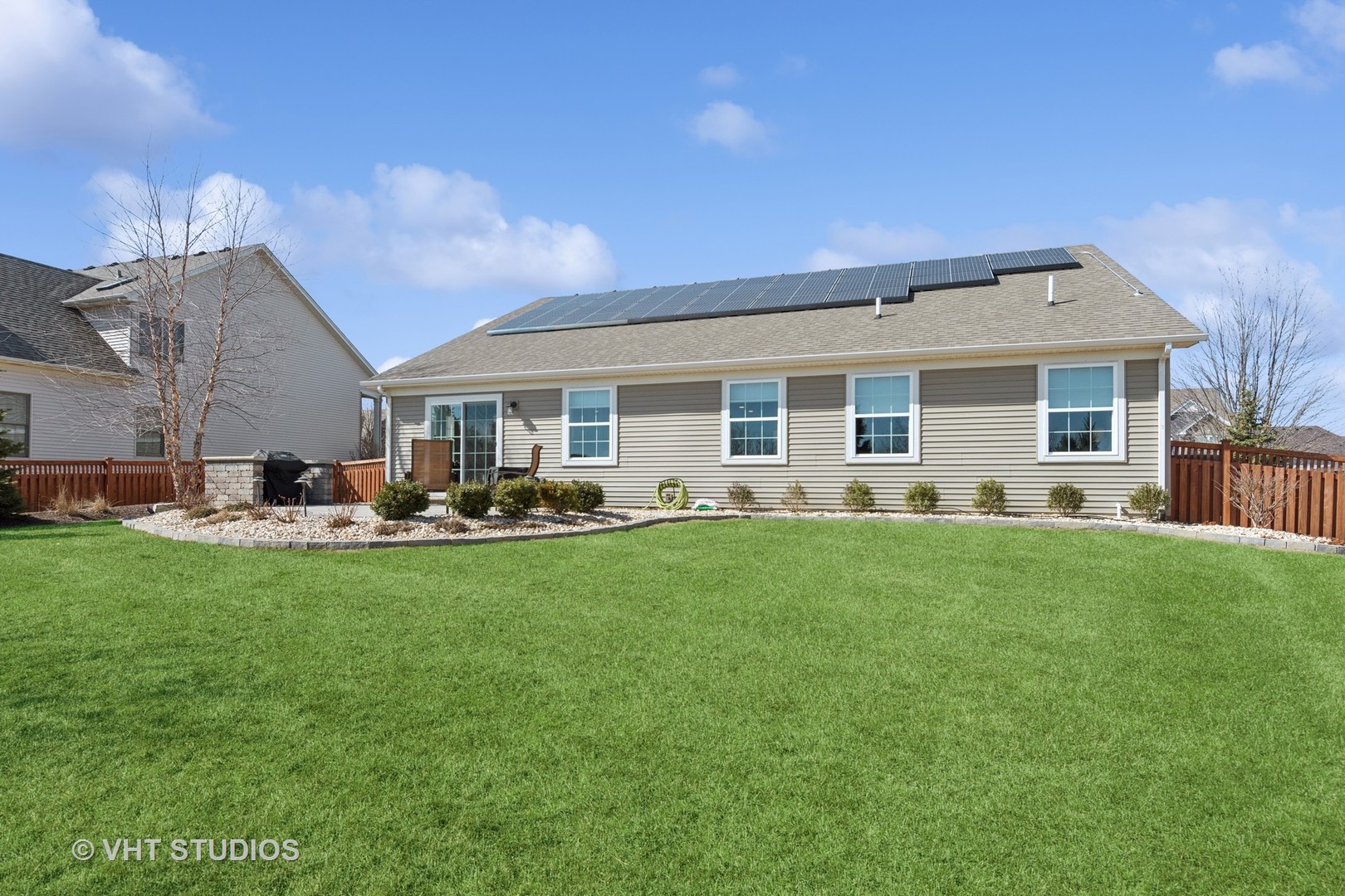13423 Summergrove Drive Plainfield, IL 60585 - Photo 25 of 37 a front view of a house with a garden