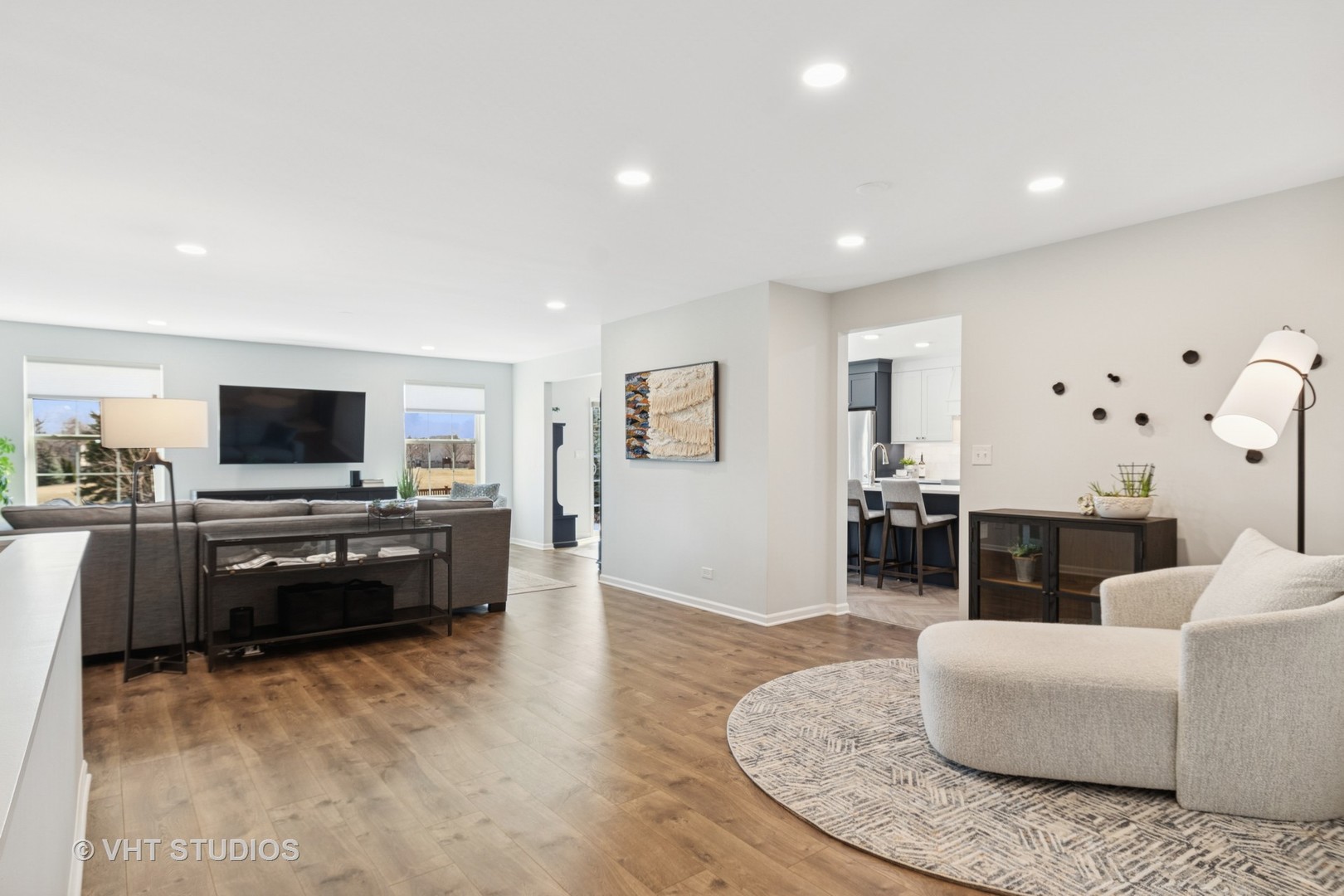 13423 Summergrove Drive Plainfield, IL 60585 - Photo 4 of 37 a living room with furniture and a flat screen tv