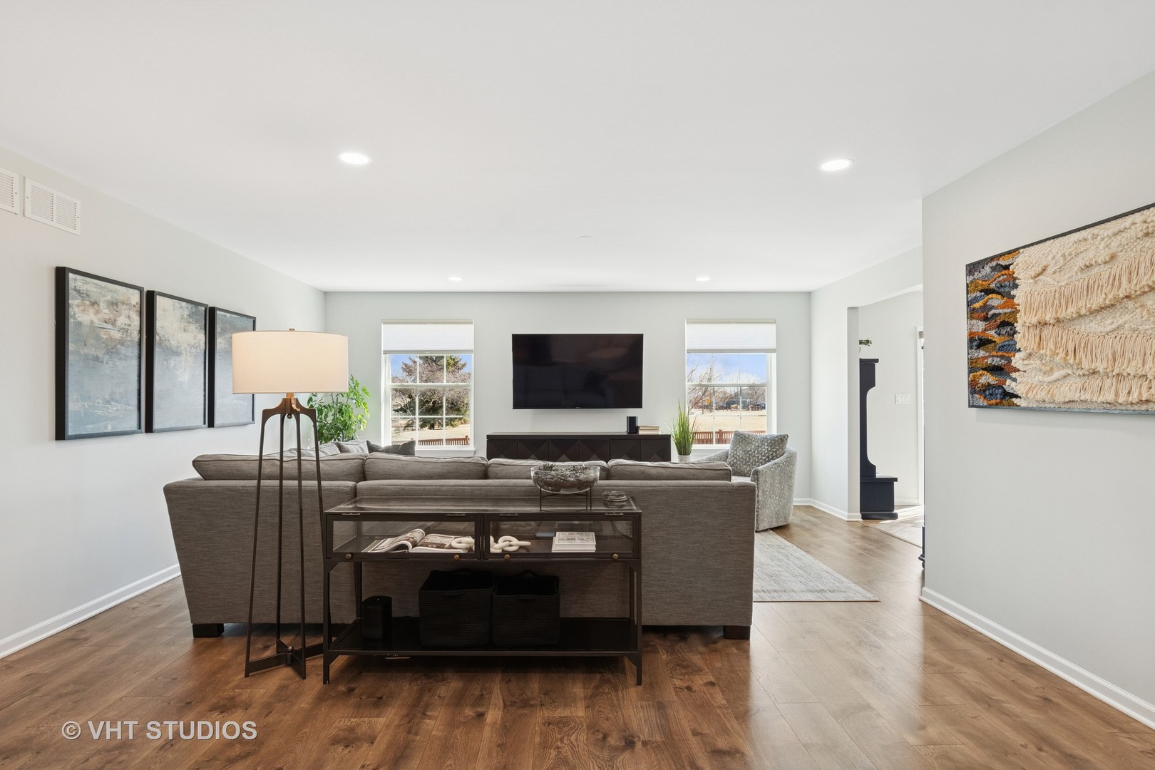 13423 Summergrove Drive Plainfield, IL 60585 - Photo 5 of 37 a living room with furniture and a flat screen tv