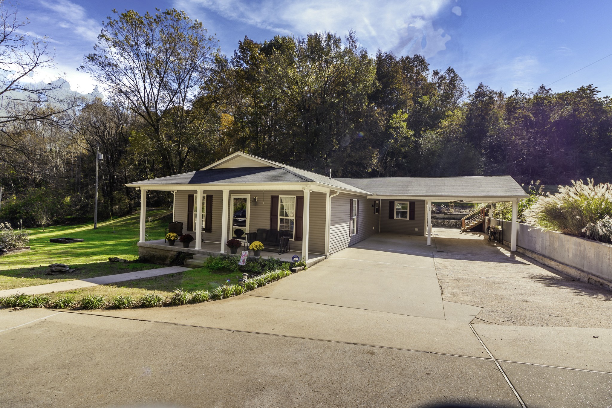 525 York Hollow Road Pulaski, TN 38478 - Photo 1 of 48 a front view of a house with garden