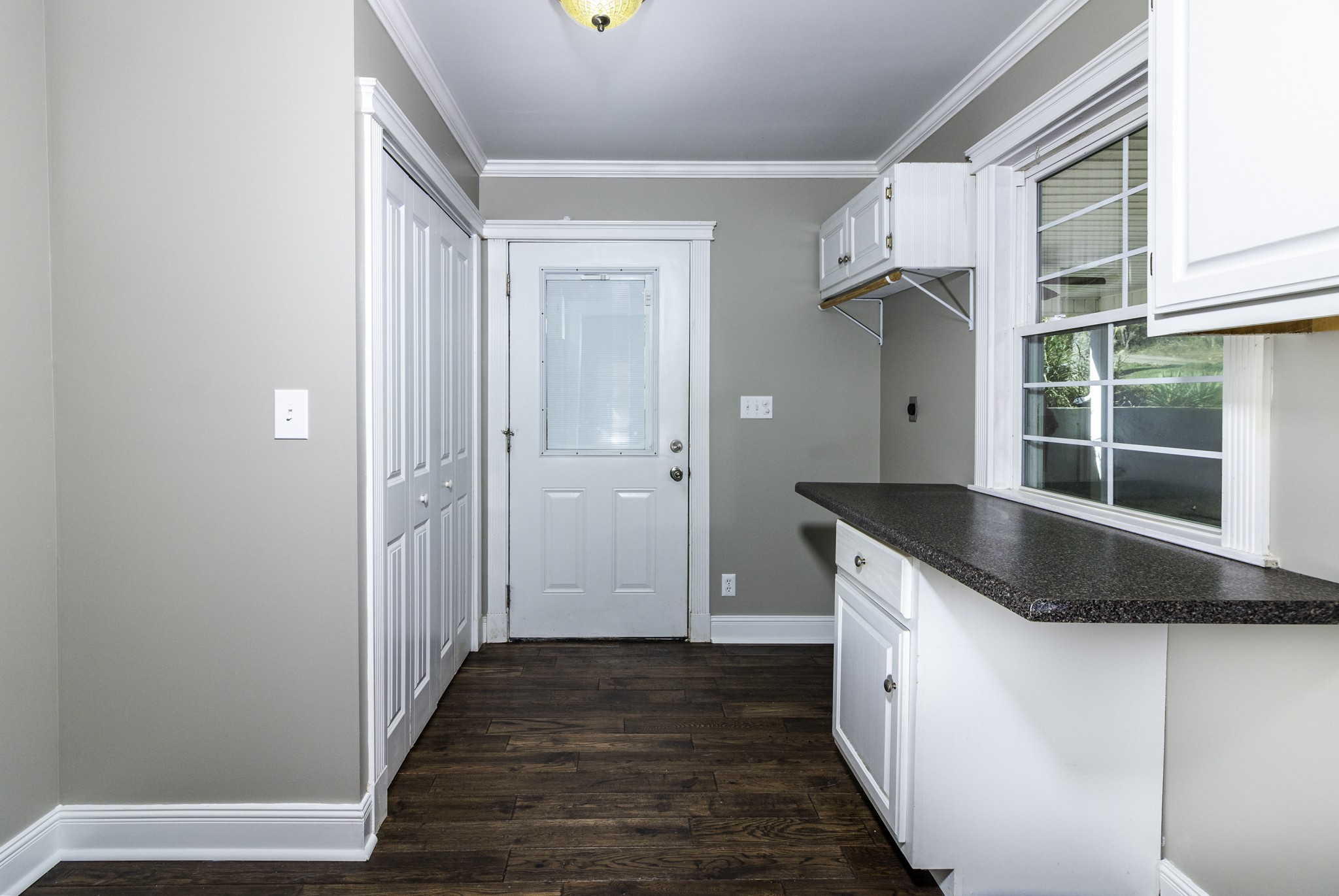 525 York Hollow Road Pulaski, TN 38478 - Photo 14 of 48 a kitchen with granite countertop a sink and a refrigerator