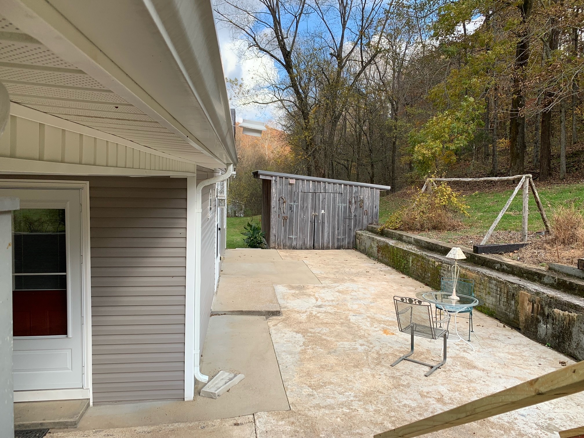 525 York Hollow Road Pulaski, TN 38478 - Photo 45 of 48 a view of a roof deck with wooden fence and a chairs
