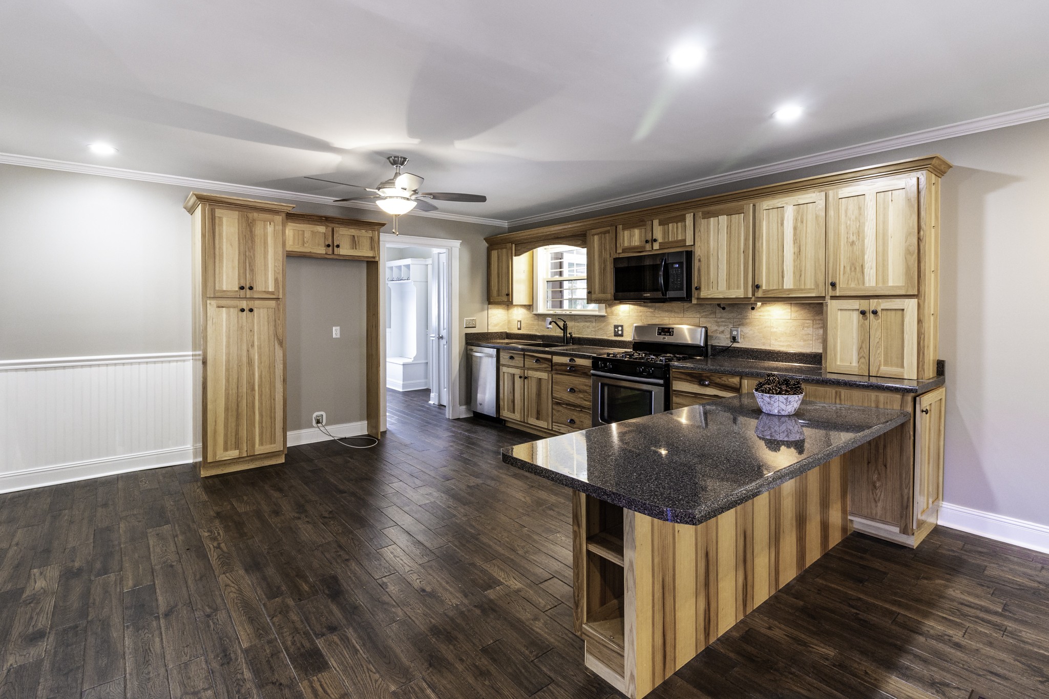525 York Hollow Road Pulaski, TN 38478 - Photo 7 of 48 a kitchen with stainless steel appliances granite countertop a stove and a sink
