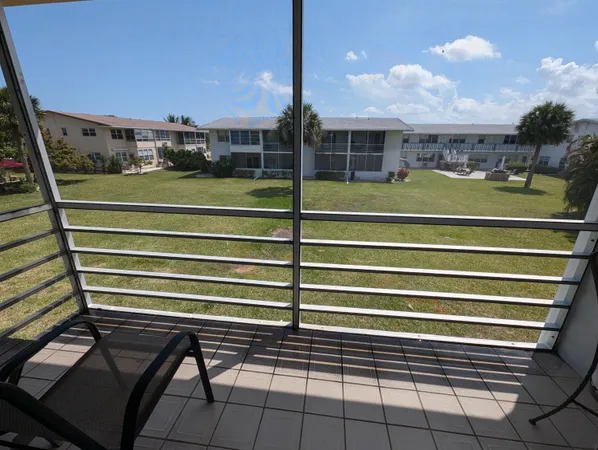 a view of a chairs and table on the terrace